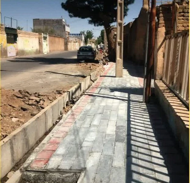 📷گزارش تصویری| ادامه ی عملیات سنگ فرش پیاده رو کوچه ۱۵خرداد ۵